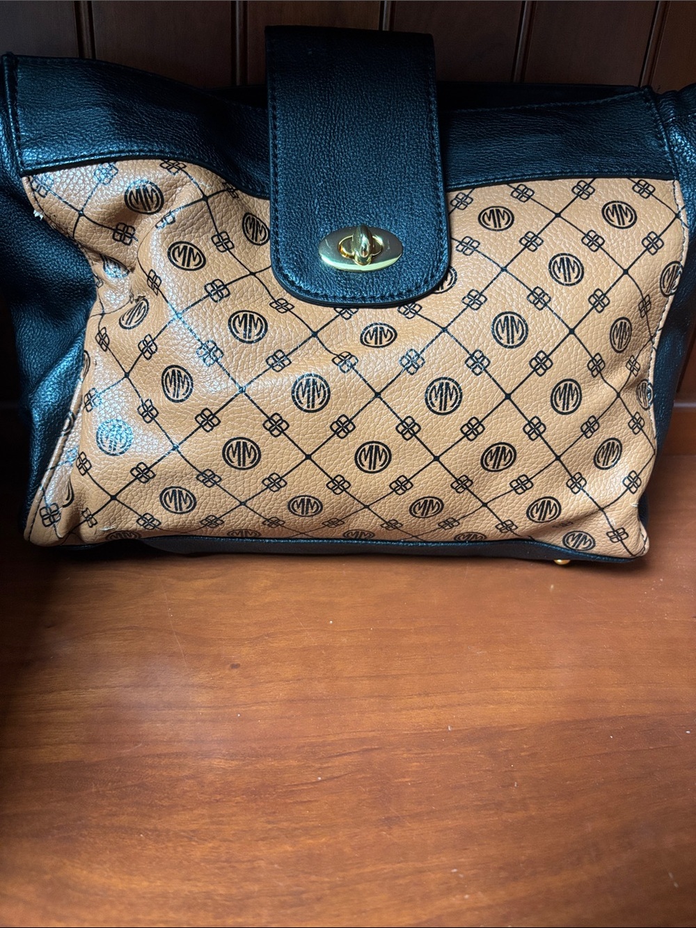 Maria Mezzanotte monogram clutch